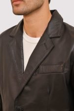 Men Black Blazer with notch lapel, two-button front closure, and tailored fit.