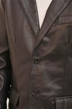 Men Black Blazer with notch lapel, two-button front closure, and tailored fit.